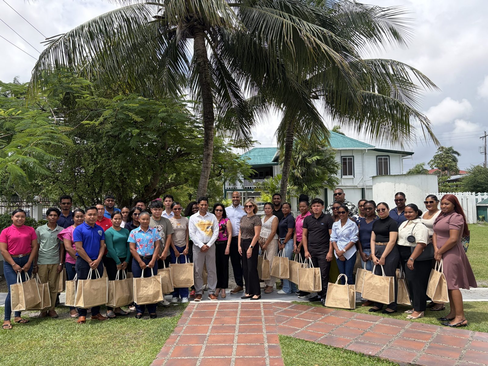 Environmental club members gathered together at an EMC Foundation event in Guyana
